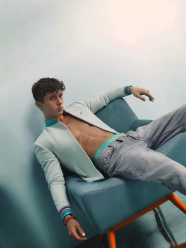 lounger,sunlounger,merman,chaise,lounging,male model,man on a bench,beach chair,chaise lounge,deck chair,photo session in the aquatic studio,abdominals,deckchair,george russell,lifeguard,lazing around,laid back,danila bagrov,sweatpant,hospital bed