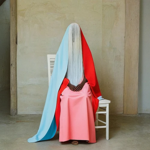 burqa,woman hanging clothes,the annunciation,girl in cloth,artist's mannequin,praying woman,conceptual photography,cloak,overskirt,armchair,folding chair,a curtain,drape,display dummy,headless,girl with cloth,sleeper chair,the angel with the veronica veil,clotheshorse,woman praying,Photography,Fashion Photography,Fashion Photography 25