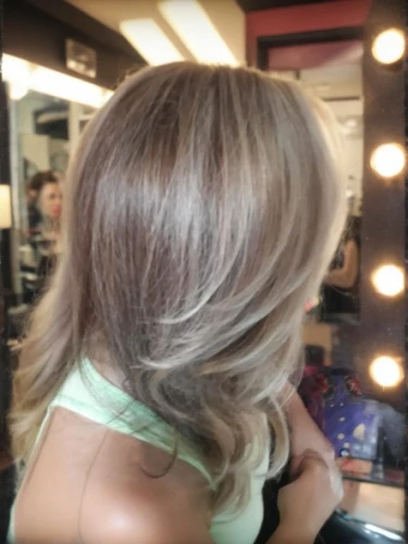 caramel color,hair coloring,trend color,asymmetric cut,layered hair,natural color,smooth hair,short blond hair,blonde,champagne color,blond hair,back of head,hair shear,hairstylist,salon,gray color,hair,silvery,pixie-bob,neutral color