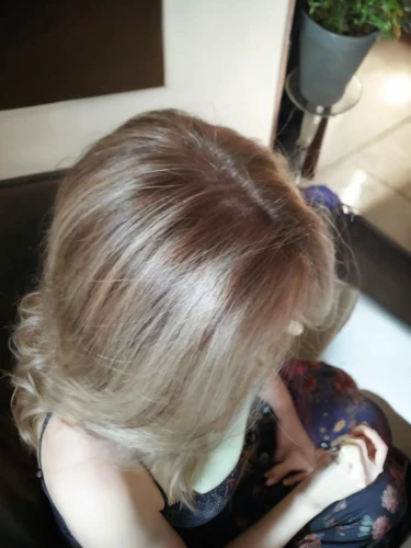 chignon,blond hair,short blond hair,blonde sits and reads the newspaper,blonde on the chair,hair coloring,blonde,blond girl,smooth hair,hair,blonde hair,blonde girl,blond,natural color,blonde woman reading a newspaper,long blonde hair,braiding,pin hair,updo,golden haired