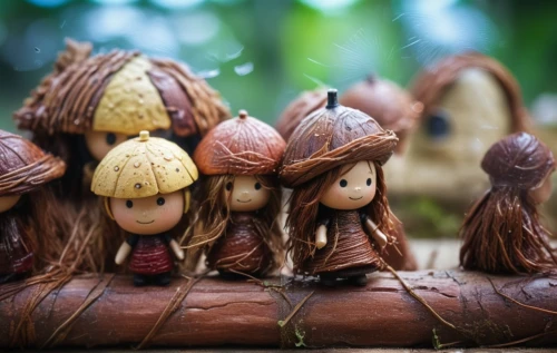 fairy house,christmas crib figures,wooden figures,arrowroot family,scandia gnomes,gnomes at table,gnomes,chestnut forest,wood angels,chestnut mushroom,wood carving,marzipan figures,thatch umbrellas,wood art,fairy village,nativity scene,little people,wooden christmas trees,bowl of chestnuts,thatch roof,Photography,General,Cinematic