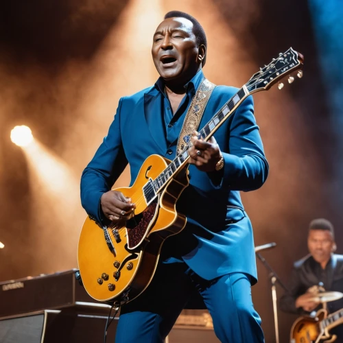 jazz guitarist,a black man on a suit,blues and jazz singer,epiphone,concert guitar,the suit,keith-albee theatre,rhythm blues,guitar player,music on your smartphone,gibson,marsalis,electric guitar,the guitar,guitarist,microphone stand,beatenberg,solo entertainer,acoustic-electric guitar,las vegas entertainer,Photography,General,Realistic