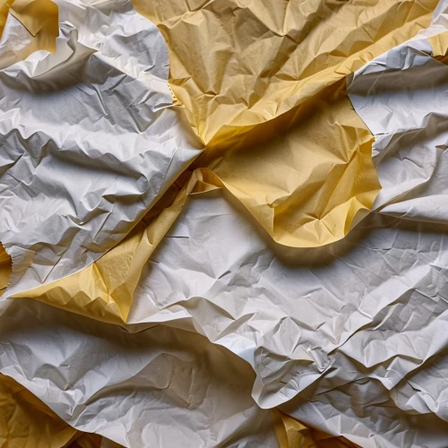 crumpled paper,wrinkled paper,tissue paper,sunflower paper,crumpled tags,crumpled,paper and ribbon,folded paper,a sheet of paper,crumpled up,kraft bag,torn paper,sheet of paper,recycled paper with cell,waste paper,recycled paper,linen paper,kitchen paper,wrapping paper,wax paper