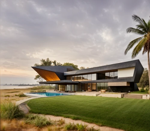 dunes house,house by the water,modern house,beach house,modern architecture,cube house,cube stilt houses,tropical house,beachhouse,mid century house,luxury property,luxury home,holiday villa,smart house,florida home,beautiful home,cubic house,summer house,house shape,house with lake