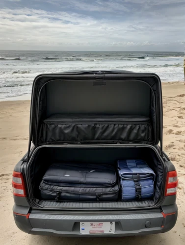 suitcases,steamer trunk,luggage compartments,suitcase in field,air mattress,vehicle cover,buick rendezvous,beach furniture,mercedes-benz gls,automotive carrying rack,toyota comfort,luggage and bags,luggage set,beach tent,surfing equipment,the beach fixing,camping car,trunk,weekendtravel,packed up