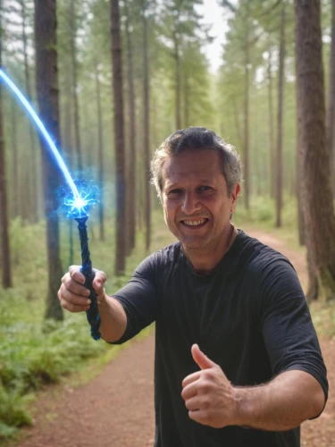 laser sword,jedi,lightsaber,man holding gun and light,laser guns,luke skywalker,starwars,laser beam,dwarf sundheim,star wars,tactical flashlight,eskrima,kenjutsu,star wood,tekwan,aaa,a flashlight,laser tag,darth wader,action hero,Outdoor,Forest