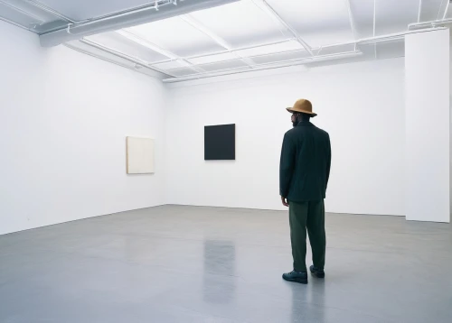 art dealer,standing man,postmasters,art gallery,a black man on a suit,white room,gallery,silhouette of man,vernissage,klaus rinke's time field,man silhouette,man with a computer,black coat,black businessman,mannequin silhouettes,black squares,black hat,matchstick man,art world,minimalism,Conceptual Art,Daily,Daily 18