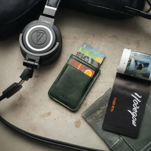 travel essentials,mp3 player accessory,portable media player,everyday carry,walkman,audio accessory,minidisc,travel bag,pocket lighter,mp3 player,audio player,atari lynx,ipod nano,mobile phone accessories,carry-on bag,radio device,music on your smartphone,micro sd card,music player,portable