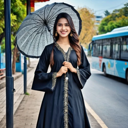 abaya,asian umbrella,academic dress,vietnamese woman,miss vietnam,traditional costume,indonesian women,islamic girl,miss circassian,muslim woman,girl in a long dress,umbrella,young model istanbul,japanese umbrella,asian costume,malaysia student,dress walk black,overhead umbrella,summer umbrella,protection from rain,Photography,General,Realistic