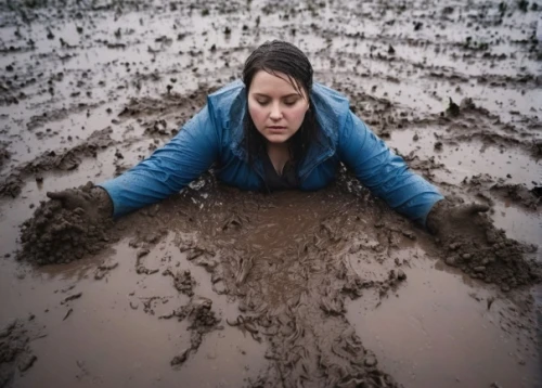 mud wrestling,mud,clay soil,muddy,mud wall,soil,obstacle race,aggriculture,molehill,soil erosion,cow dung,woman at the well,mud bogging,farmworker,farm girl,buried,molehills,plough,mud village,field cultivation