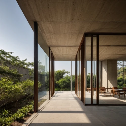 dunes house,exposed concrete,archidaily,corten steel,timber house,concrete slabs,japanese architecture,concrete ceiling,daylighting,concrete construction,cubic house,mid century house,modern architecture,glass facade,wooden windows,residential house,frame house,concrete blocks,kirrarchitecture,structural glass