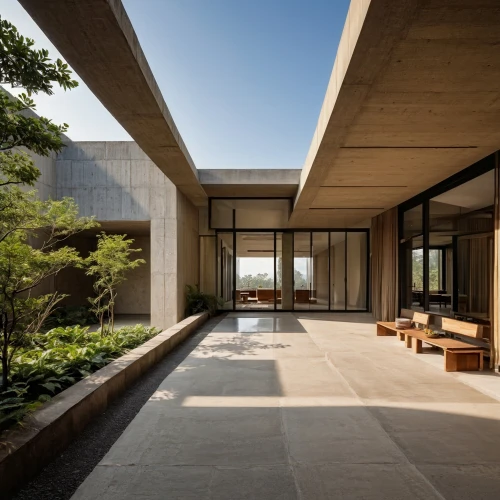 dunes house,exposed concrete,archidaily,japanese architecture,concrete slabs,corten steel,concrete ceiling,concrete construction,brutalist architecture,mid century house,kanazawa,concrete,ryokan,japanese zen garden,zen garden,daylighting,mid century modern,concrete blocks,modern architecture,kirrarchitecture