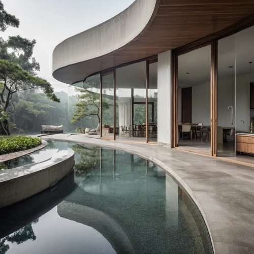 dunes house,asian architecture,pool house,modern house,zen garden,japanese architecture,modern architecture,infinity swimming pool,house by the water,beautiful home,luxury property,japanese zen garden,cube house,exposed concrete,mid century house,private house,luxury home interior,archidaily,cubic house,luxury bathroom