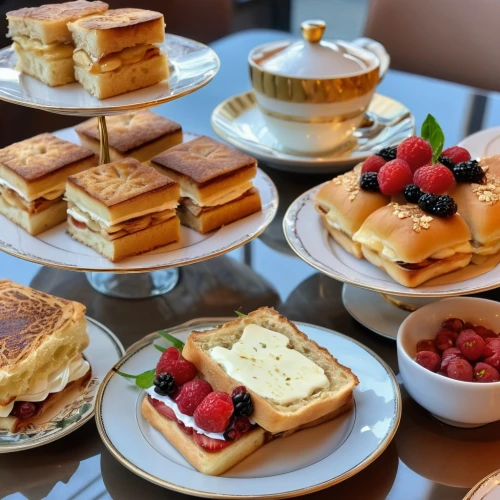 breakfast at caravelle saigon,breakfast buffet,pastries,high tea,breakfast hotel,afternoon tea,sweet pastries,stack cake,mille-feuille,cake buffet,tea sandwich,layer cake,fika,pastry,brunch,desserts,have breakfast,plate of pancakes,brunches,party pastries