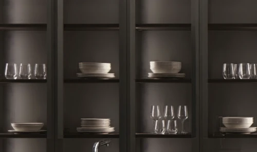 under-cabinet lighting,serveware,kitchenware,tableware,barware,plate shelf,silver cutlery,dishware,cookware and bakeware,dark cabinets,dark cabinetry,glasswares,shelving,glassware,stemware,dinnerware set,kitchen utensils,dish storage,cupboard,glass containers