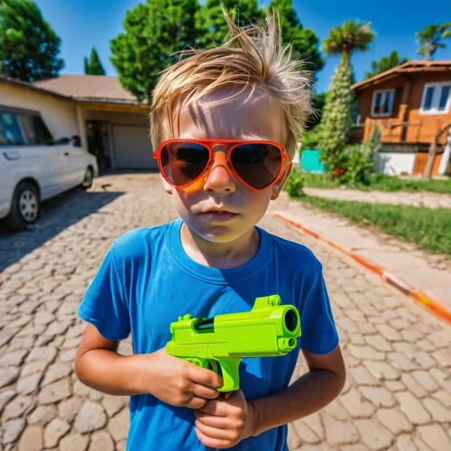 water gun,photographing children,man holding gun and light,girl with gun,the sandpiper combative,radio-controlled toy,holding a gun,gun accessory,girl with a gun,laser guns,woman holding gun,water fight,kids' things,back-to-school package,airsoft gun,body camera,home security,kid hero,moms entrepreneurs,heat gun,Photography,General,Realistic