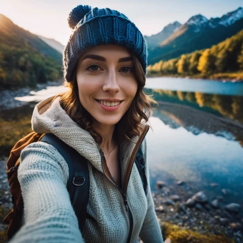 girl wearing hat,travel woman,a girl with a camera,alaska,beanie,mountain hiking,vermilion lakes,nature photographer,autumn background,girl on the river,landscape background,pond lenses,hiking equipment,outdoor life,people in nature,outdoor recreation,yukon territory,swedish german,hiking,fjäll,Photography,General,Realistic
