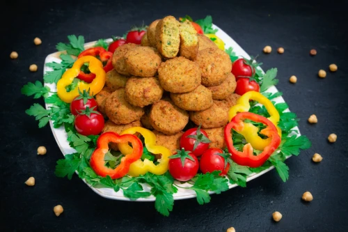 falafel,batata vada,shami kebab,chelow kabab,panipuri,kabab koobideh,pakora,kibbeh,arancini,kofta,kofte kebab,shrimp croquette,canapé,adana kebabı,potatoes with vegetables,fishcake,dahi vada,pakistani cuisine,diwali sweets,burji kalifa