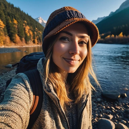 vermilion lakes,girl wearing hat,british columbia,beanie,banff alberta,banff,the blonde in the river,glacier national park,tofino,montana,brown hat,autumn icon,girl on the river,swiftcurrent lake,heidi country,autumn background,bow valley,knit hat,vancouver island,leather hat,Photography,General,Realistic
