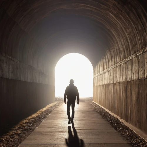 tunnel,man holding gun and light,wall tunnel,vanishing point,pathway,the way,the path,road of the impossible,canal tunnel,walking man,railway tunnel,passage,hollow way,inner light,underpass,leaving your comfort zone,road to nowhere,woman walking,walkway,the mystical path,Photography,General,Realistic