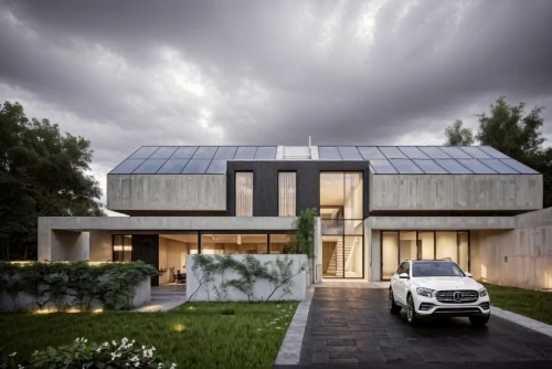 folding roof,modern house,cubic house,eco-construction,slate roof,metal roof,modern architecture,timber house,cube house,roof panels,metal cladding,residential house,solar panels,dunes house,smart home,smart house,solar photovoltaic,residential,glass facade,archidaily