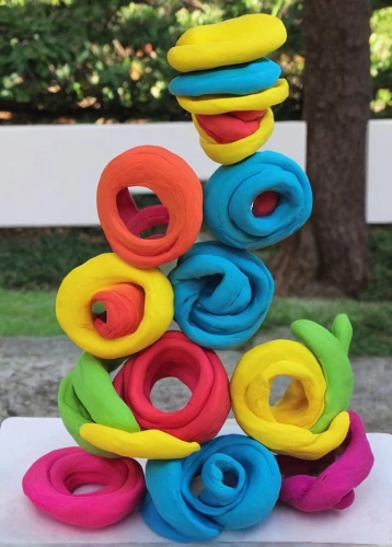 colorful pasta,pacifier tree,stack cake,stacked cups,colorful spiral,play-doh,murukku,saturnrings,stack of plates,stylized macaron,play doh,colored icing,discs,motor skills toy,stack of letters,yo-yo,circular puzzle,artistic roller skating,torus,cake stand,Unique,3D,Clay