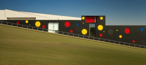 three primary colors,facade panels,sport venue,driving range,indoor games and sports,racing flags,futuristic art museum,race track flag,racecourse,race track,paint spots,traffic light phases,colorful facade,racetrack,paddock,silverstone,shooting range,sports wall,heart traffic light,hume highway,Photography,General,Realistic