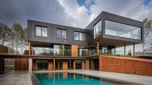 modern house,modern architecture,cube house,cubic house,dunes house,contemporary,residential house,glass facade,modern style,brick house,timber house,luxury property,residential,glass blocks,glass facades,two story house,luxury home,glass wall,corten steel,cube stilt houses