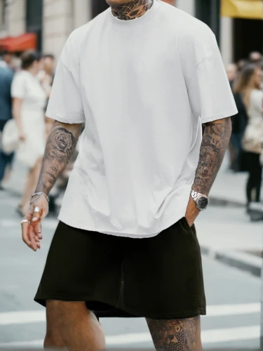 skort,rugby short,sleeve,kilt,shorts,street fashion,man's fashion,long-sleeved t-shirt,bermuda shorts,cycling shorts,see-through clothing,punk,white skirt,tattooed,pedestrian,a pedestrian,white clothing,jogger,long-sleeve,cargo