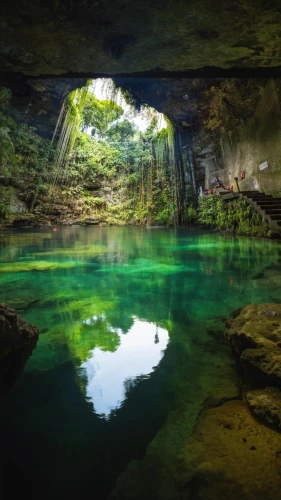 cenote,cave on the water,blue cave,pit cave,underground lake,the limestone cave entrance,limestone arch,cave,underwater oasis,sea cave,cave tour,belize,blue caves,the blue caves,natural arch,herman national park,yucatan,white springs,glass rock,underwater landscape