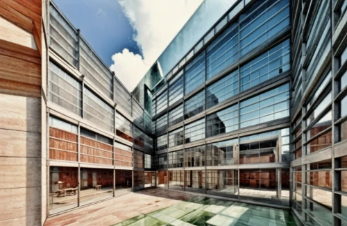glass facade,glass facades,structural glass,office buildings,glass building,glass panes,glass wall,office building,archidaily,kirrarchitecture,business school,daylighting,glass blocks,biotechnology research institute,offices,facade panels,window film,corporate headquarters,company headquarters,modern office