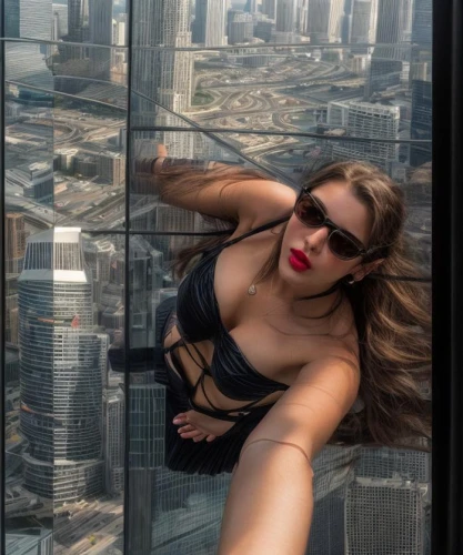 above the city,window cleaner,base jumping,high-rise,up high,burj khalifa,high rise,vertigo,hanging down,at the top,tallest hotel dubai,from the top,sexy woman,agent provocateur,window washer,skyscapers,in the air,bangkok,burj,34 meters high,Common,Common,Photography