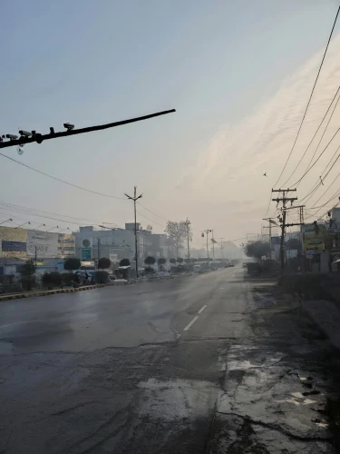 tram road,national highway,post-apocalyptic landscape,empty road,overhead power line,city highway,street lamps,power pole,street view,pripyat,baghdad,chennai,trolleybuses,play street,the street,lahore,industrial area,street lamp,gregory highway,pyongyang