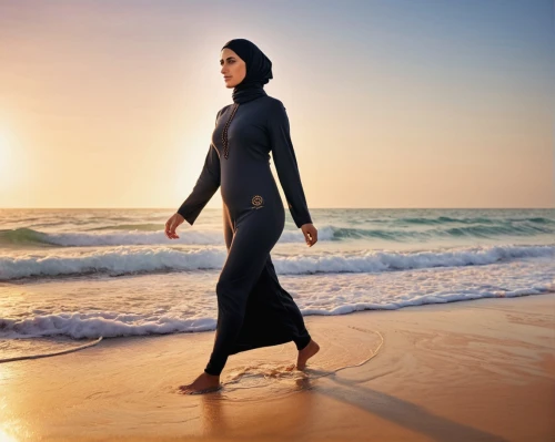 wetsuit,open water swimming,female swimmer,muslim woman,freediving,woman walking,sprint woman,endurance sports,surfing equipment,fish oil capsules,naturopathy,surfboard shaper,walk on the beach,one-piece garment,woman silhouette,islamic girl,coastal protection,travel woman,abaya,hijaber,Photography,General,Commercial