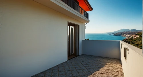exterior decoration,block balcony,stucco wall,window with sea view,sveti stefan,seaside view,luxury property,positano,ocean view,flat roof,stucco frame,prefabricated buildings,gold stucco frame,roof landscape,window with shutters,holiday villa,balcony,roof tile,walkway,residential property