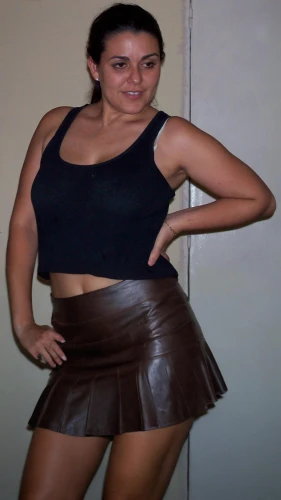 in pantyhose,pantyhose,skort,brown fabric,social,broncefigur,hard woman,see-through clothing,female model,fitness model,lara,kamini,kamini kusum,skirt,plus-size model,cutout,sackcloth,girdle,trash bag,leather texture