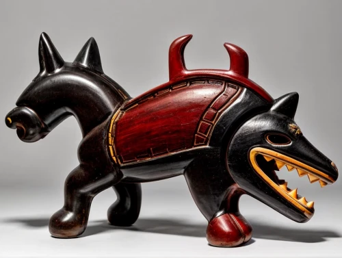 toy manchester terrier,animal figure,tribal bull,english toy terrier,oxcart,scottish terrier,oxpecker,chinese imperial dog,capitoline wolf,schutzhund,old english terrier,cavalry trumpet,wooden rocking horse,rhinoceros beetle,tapir,manchester terrier,uintatherium,boar,doberman,pinscher