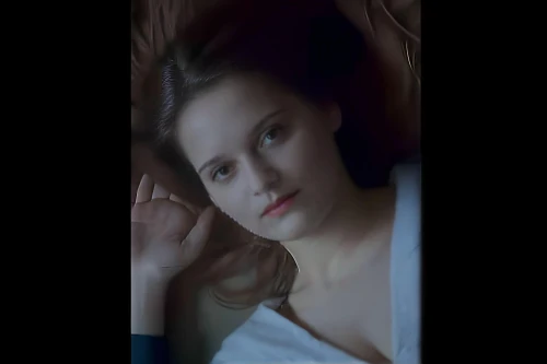 video clip,female model,blurred,siren,angelic,retouch,young woman,girl in bed,model,pale,video scene,the girl is lying on the floor,vogue,daisy jazz isobel ridley,cg,angel,romantic look,tease,teen,retouching