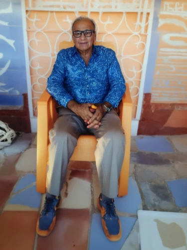 amitava saha,social,jawaharlal,maldives mvr,devikund,maldivian rufiyaa,bapu,abdel rahman,in seated position,mukesh ambani,club chair,rangpur,kabir,burj al arab,benagil,vipassana,founder,cinema seat,elderly man,foot reflexology