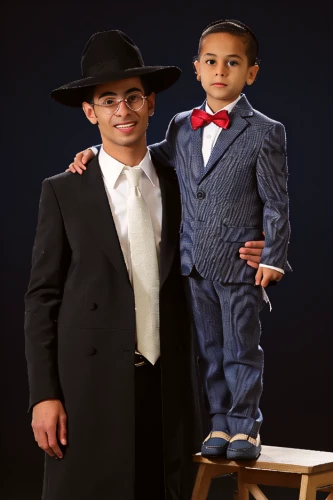 ventriloquist,man and boy,boy's hats,father with child,image manipulation,fedora,gentleman icons,children's photo shoot,custom portrait,men's suit,social,portrait photographers,dad and son,photos of children,men clothes,men hat,a wax dummy,father and son,portrait background,men's hats