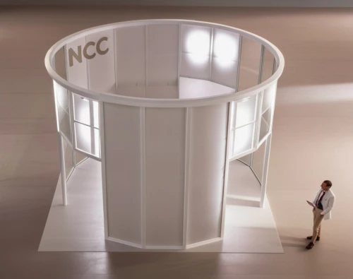 interactive kiosk,cnc,revolving door,arc,will free enclosure,door-container,nfc,ncas,cng,chair circle,cyclocomputer,circular staircase,rotating beacon,sales booth,kinetic art,apple desk,data center,arc of constant,metal container,a museum exhibit,Photography,General,Realistic