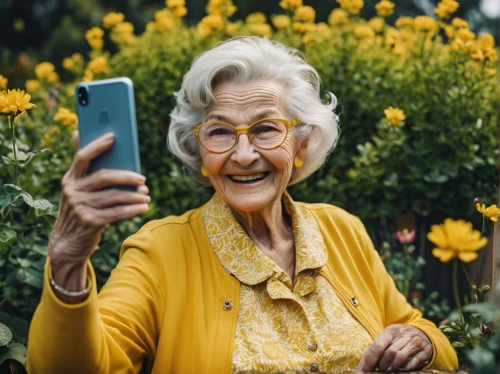 woman holding a smartphone,care for the elderly,nanas,elderly person,elderly lady,elderly people,respect the elderly,elderly,grandma,reading glasses,older person,woman eating apple,using phone,turn off your cell phone,old people,taking photos,blogs of moms,mobile banking,social media addiction,grandmother,Photography,Documentary Photography,Documentary Photography 06