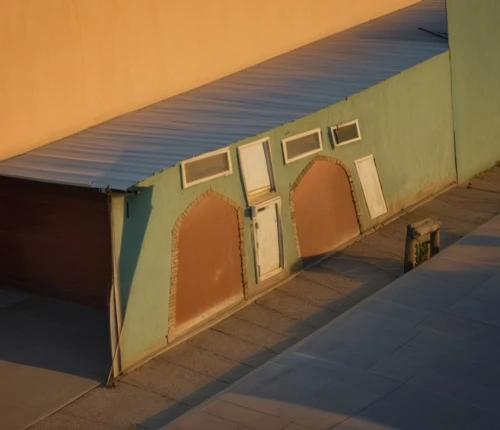 awnings,beach hut,beach huts,bus shelters,roofline,dugout,school benches,house roofs,store fronts,sheds,vault (gymnastics),roofs,huts,awning,benches,overpass,garage door,loading dock,underpass,skate park,Photography,General,Realistic