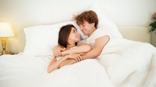 woman on bed,romantic scene,cardiac massage,as a couple,loving couple sunrise,young couple,couple - relationship,hypersexuality,cuddling,girl in bed,amorous,honeymoon,romantic portrait,baukegel,couple in love,love couple,love in the mist,wedding ring cushion,romantic night,bed linen