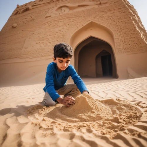 sand sculptures,sand castle,sand sculpture,sand art,sand timer,sand clock,building sand castles,sand pattern,sandcastle,sand paths,durman,libyan desert,qasr al watan,jaisalmer,sand,king abdullah i mosque,ibn tulun,sand waves,playing in the sand,wadirum,Photography,Documentary Photography,Documentary Photography 11