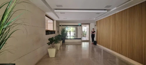 hallway space,corridor,hallway,hotel hall,laminated wood,lobby,room divider,assay office,contemporary decor,wall plaster,search interior solutions,entry path,structural plaster,wood-fibre boards,patterned wood decoration,bamboo curtain,meeting room,wall panel,entry,entrance hall