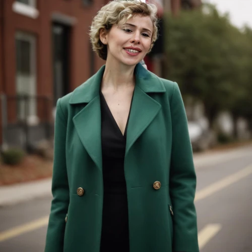 bolero jacket,pantsuit,woman in menswear,coat,female doctor,green jacket,green dress,academic dress,politician,virginia,real estate agent,irish soft-coated wheaten terrier,jacket,virginia sweetspire,mayor,old coat,marina,long coat,trench coat,in green