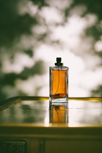 perfume bottle,perfume bottle silhouette,parfum,fragrance,orange scent,aftershave,isolated bottle,perfume bottles,creating perfume,bottle of oil,poison bottle,natural perfume,bottle fiery,still life photography,perfumes,flask,message in a bottle,home fragrance,scent of jasmine,cosmetic oil