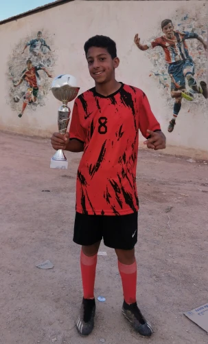 soccer player,footballer,handball player,street football,freestyle football,abdel rahman,playing football,football player,soccer,children's soccer,footbag,futsal,soccer ball,footbal,playing sports,world cup,wall & ball sports,hurghada,al qudra,sports jersey