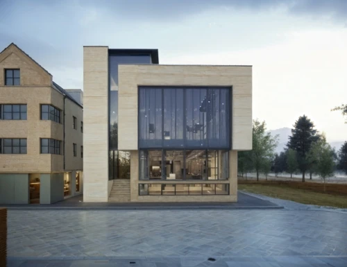 house hevelius,music conservatory,new housing development,school design,housebuilding,appartment building,metal cladding,frisian house,danish house,cubic house,prefabricated buildings,modern architecture,modern house,timber house,modern building,glass facade,residential house,3d rendering,archidaily,corten steel
